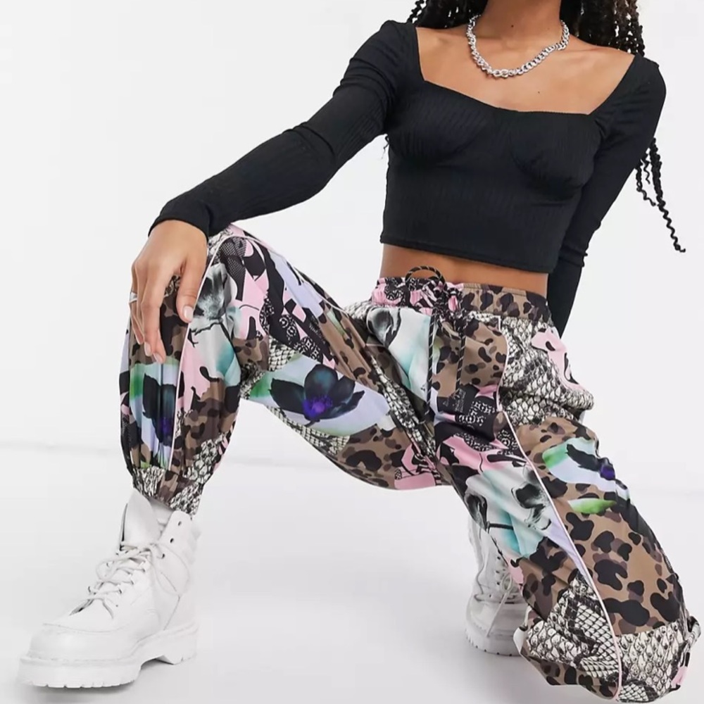ASOS Collusion sweatpants in mixed animal print